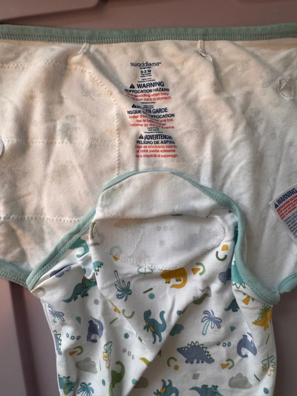 SwaddleMe White Bib with Green, Blue and Yellow Dinosaur Print 0-3 months‎